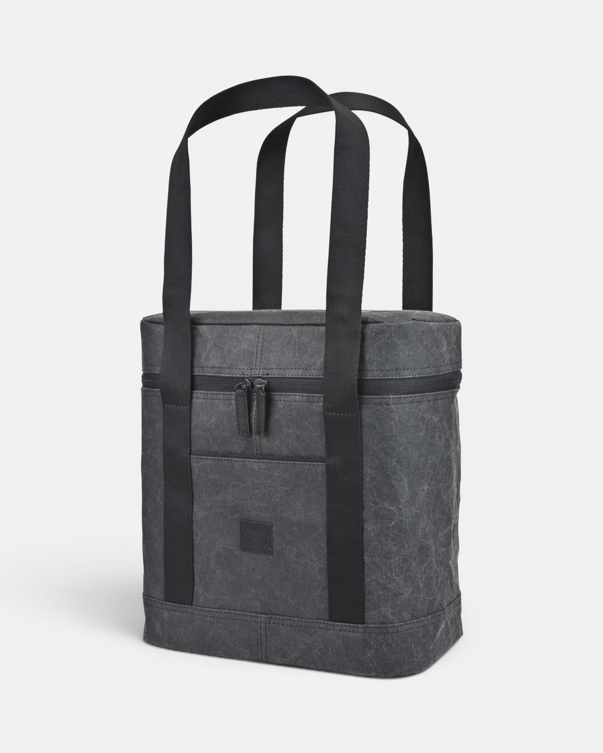 Walrus insulated picnic cooler in ebony, angled view